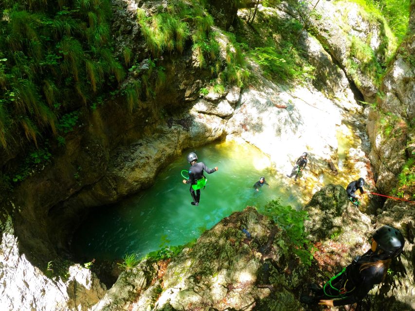 Bovec: 100% Unforgettable Canyoning Adventure + FREE photos - Rappelling down the 12-meter waterfall