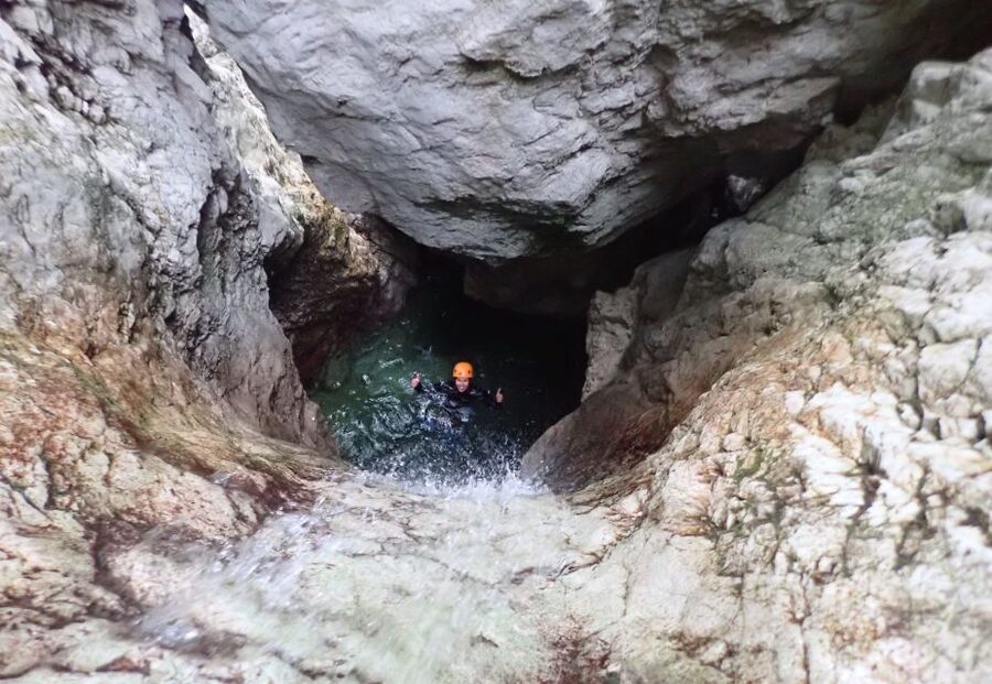 Bovec: Sušec Canyon Canyoning Experience - Entering the canyon and meeting the waterfalls