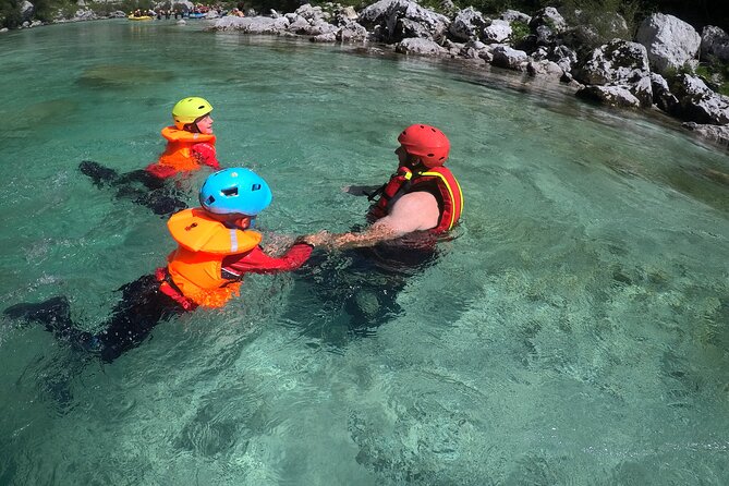 CLASSIC RAFTING on Soča river - Swimming, rock jumps, and the cold-water reality