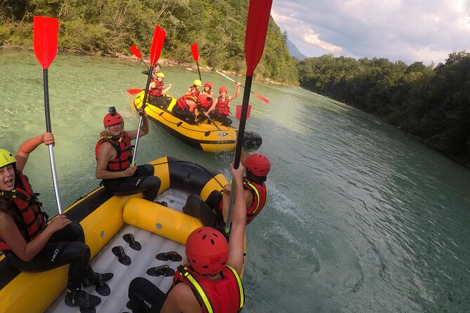 Family Rafting On Soca River - On the easy section of the emerald Soča