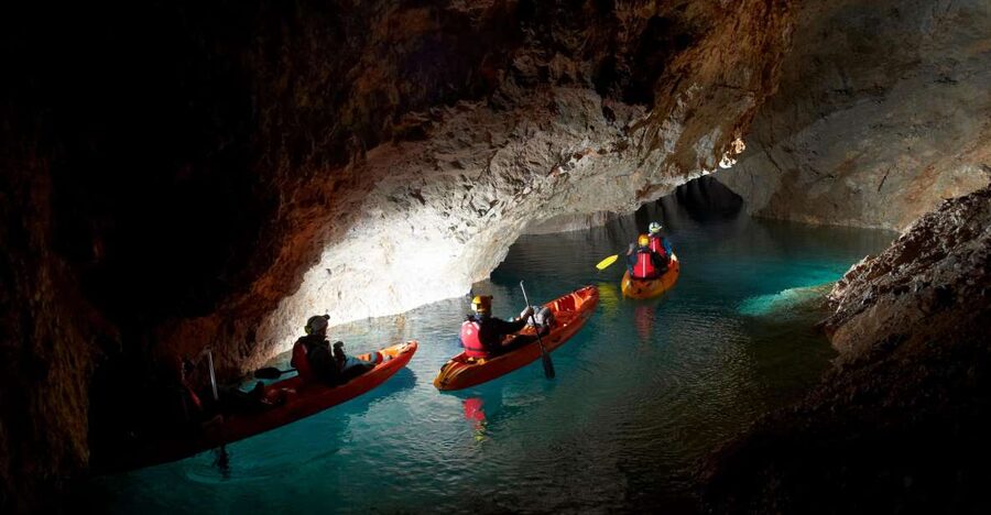 From Bled: Full-Day Underground Kayaking - Four hours underground at 10°C