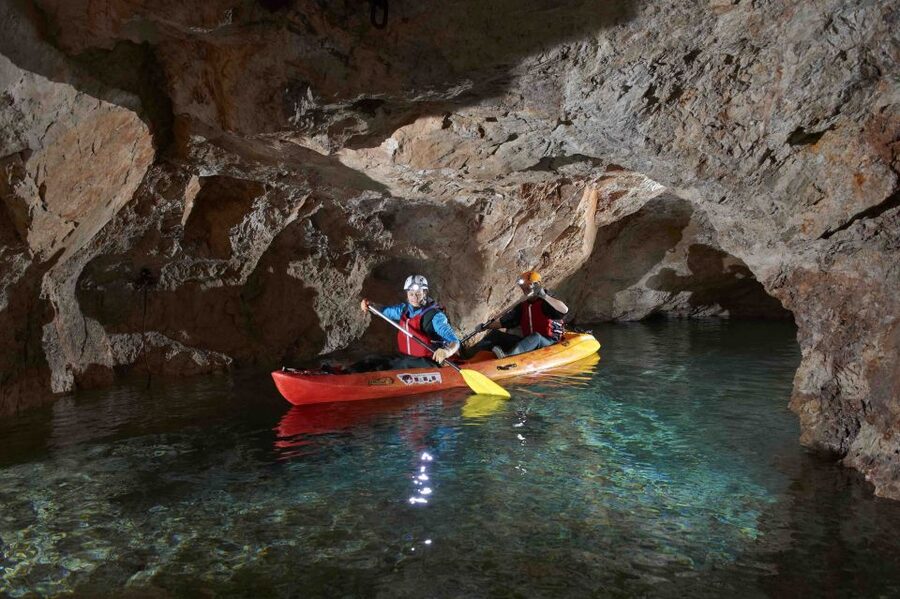 From Bled: Full-Day Underground Kayaking - Riding an old train into the mine