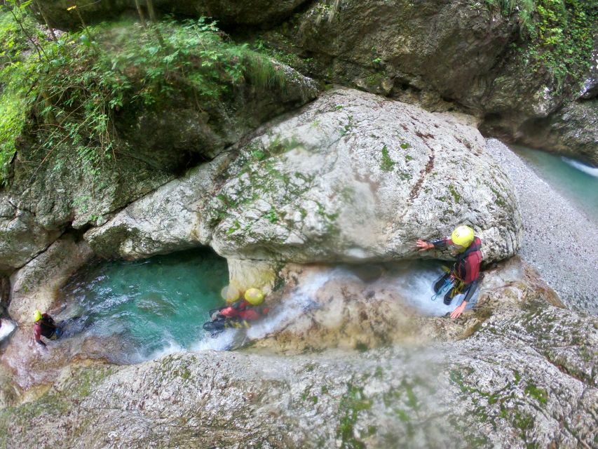 From Bovec: Half-Day Canyoning Tour in Soča Valley - The final features: an 8-meter slide and 12-meter jump