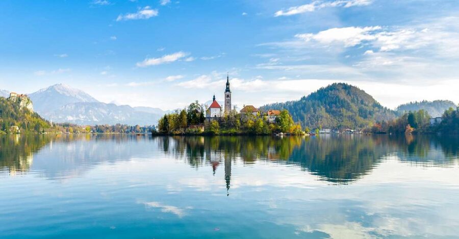 From Ljubljana: Lake Bled & Postojna Cave with Entry Tickets - Predjama Castle: medieval drama in a cliff