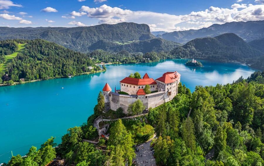 From Ljubljana: Postojna Cave, Predjama Castle and Lake Bled - Postojna Cave: Slovenia’s spectacular underground show
