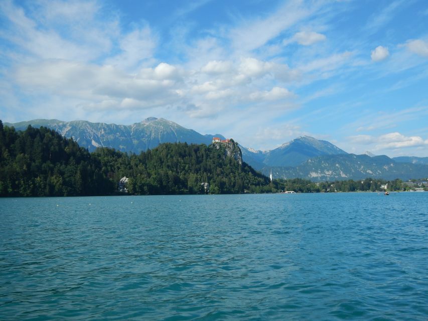 From Ljubljana: Private Bled Lake Day Trip - Taking the Pletna boat to the island
