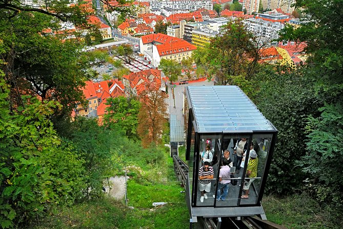 Guided Walk and Funicular Ride to Ljubljana Castle - Starting at the riverfront Tourist Information Center