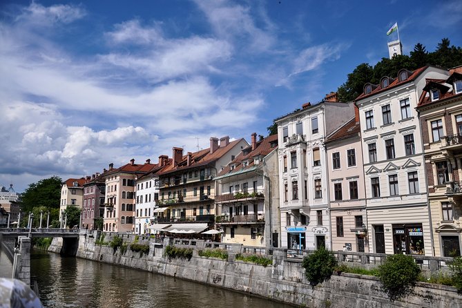 Historic Ljubljana Tour with Ljubljana Castle included - Baroque, civic, and judicial stories around the river