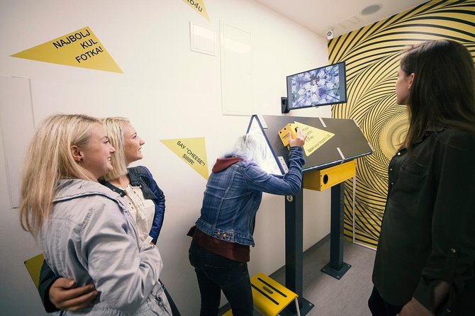 House of Illusions Ljubljana Entrance Ticket - The Ames room makes people change size