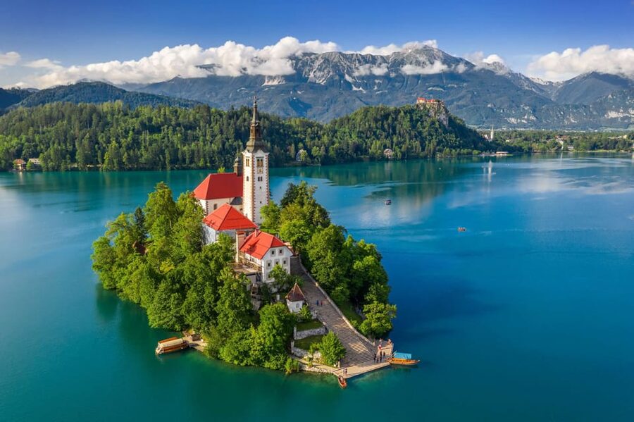 Ljubljana: Lake Bled, Postojna Cave, and Predjama Day Tour - The pletna boat to Bled Island