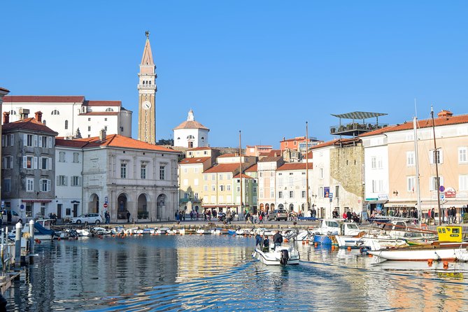 Piran Old Town Walking Tour - First of May Square shows an older Piran