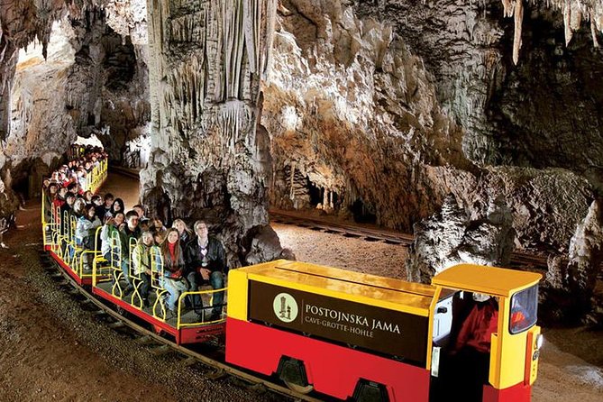 Postojna Cave and Predjama Castle Trip including entry tickets - Predjama Castle under a 123-meter rock arch