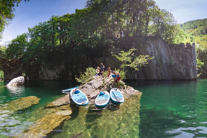 Private Half Day Stand-up Paddle Boarding on the Soča River - Learning to stand before exploring the lake