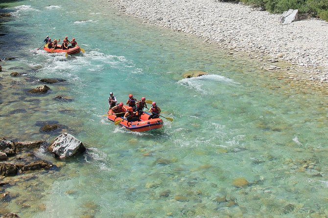 Whitewater Rafting on Soca River, Slovenia - On the Soča: rapids, teamwork, and mountain views